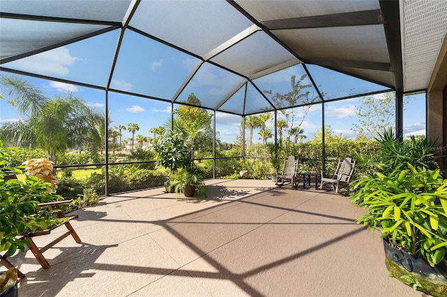 view of patio / terrace with glass enclosure