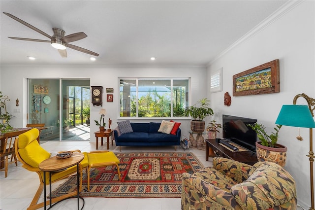 tiled living room featuring ornamental molding and ceiling fan