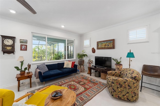 living room featuring ornamental molding, a healthy amount of sunlight, and light tile patterned floors