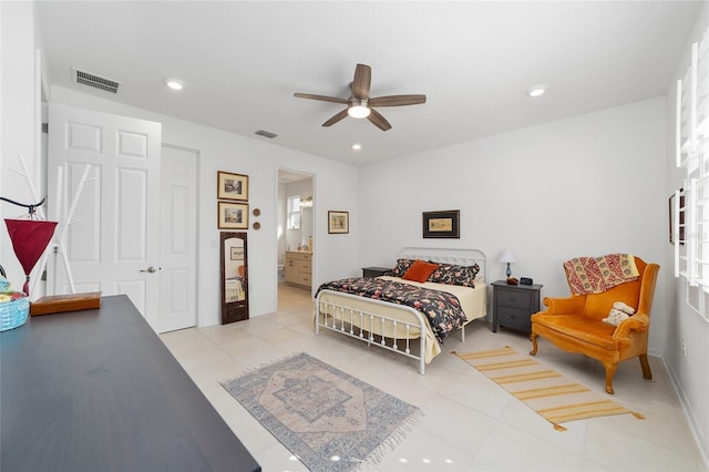 tiled bedroom featuring a closet, ceiling fan, and ensuite bathroom