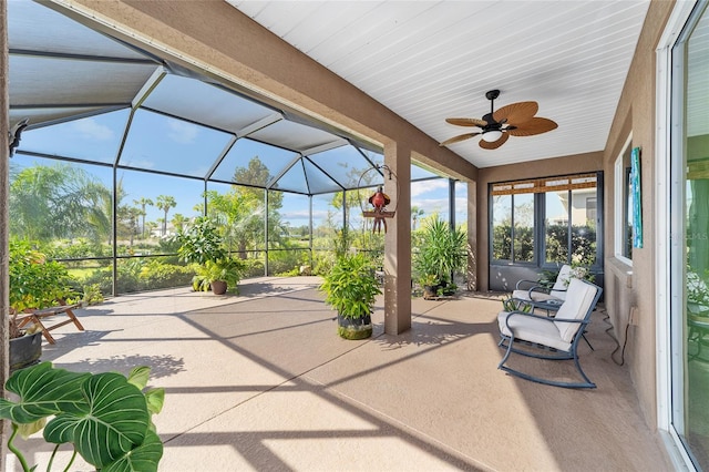 sunroom / solarium with ceiling fan