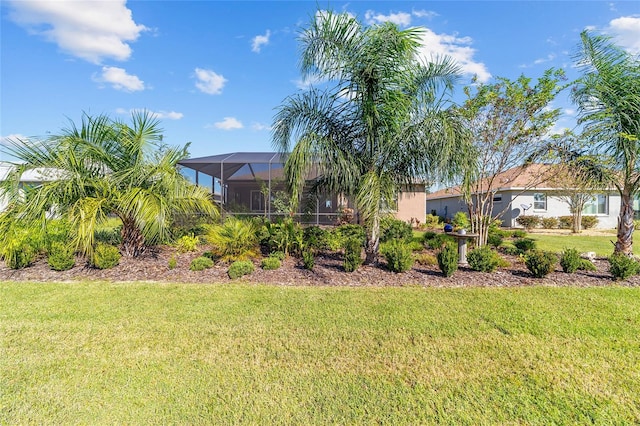 view of yard featuring a lanai