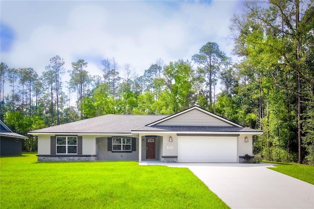 ranch-style home featuring a garage and a front lawn