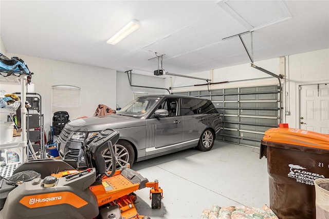 garage featuring a garage door opener