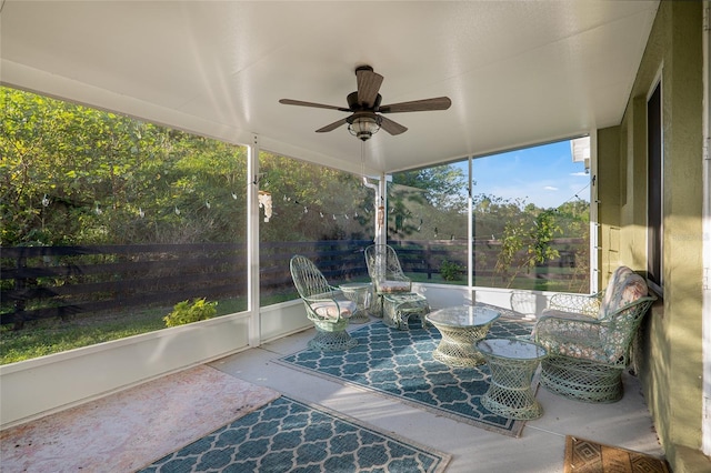 sunroom / solarium with ceiling fan