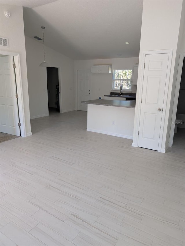 interior space with vaulted ceiling