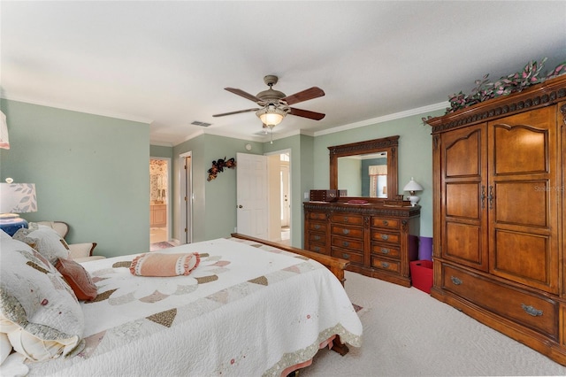 bedroom featuring connected bathroom, ceiling fan, ornamental molding, and carpet