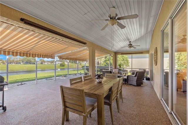 sunroom / solarium with ceiling fan