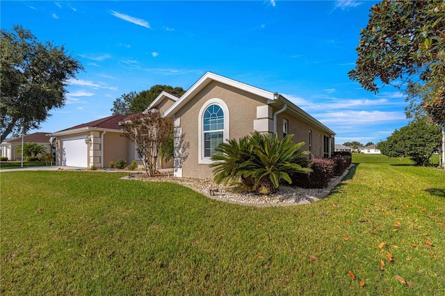 1960 NW 50th Cir, Ocala, FL 34482 - view of front of house with stucco siding, a garage, a front yard, and driveway