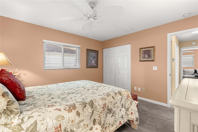 bedroom featuring a closet, ceiling fan, and carpet floors