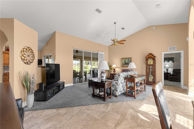 living room featuring vaulted ceiling and ceiling fan