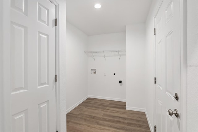 laundry area with washer hookup, dark hardwood / wood-style flooring, and electric dryer hookup