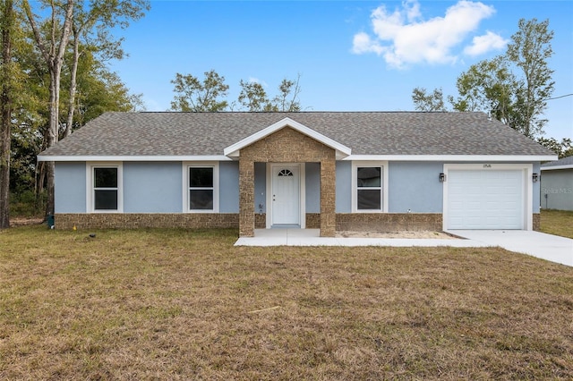 ranch-style house with a garage and a front lawn