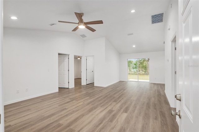 unfurnished bedroom featuring ceiling fan, access to exterior, high vaulted ceiling, and light hardwood / wood-style flooring