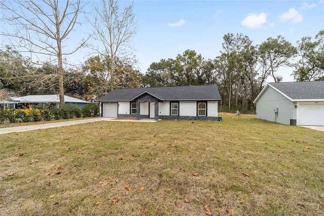 ranch-style home with a front yard and a garage