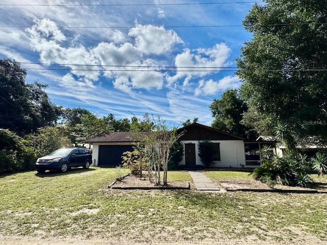 view of front of house with a front lawn