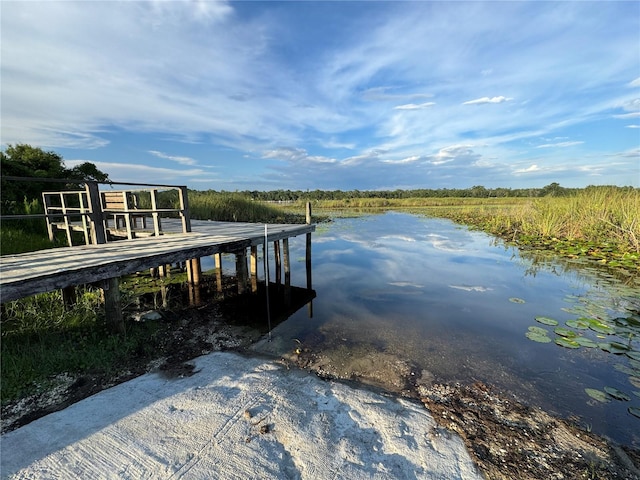 view of dock with a water view