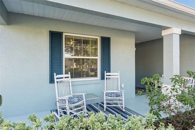 property entrance with a porch