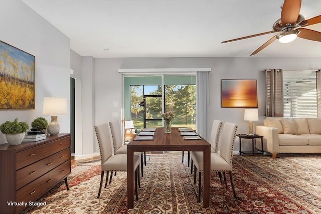 dining room featuring ceiling fan