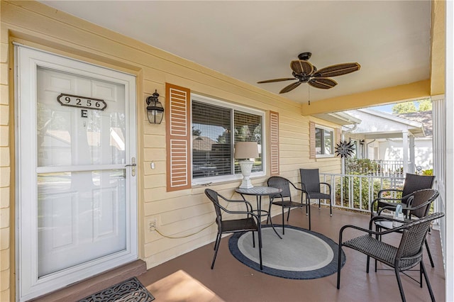 exterior space with ceiling fan and plenty of natural light