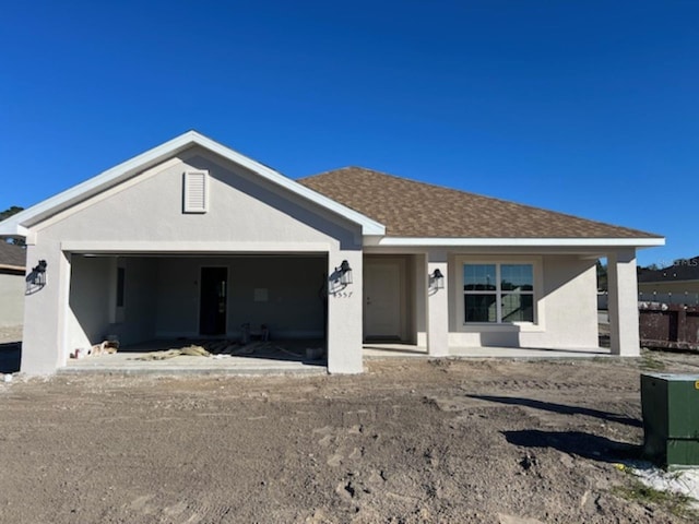 ranch-style home with a garage