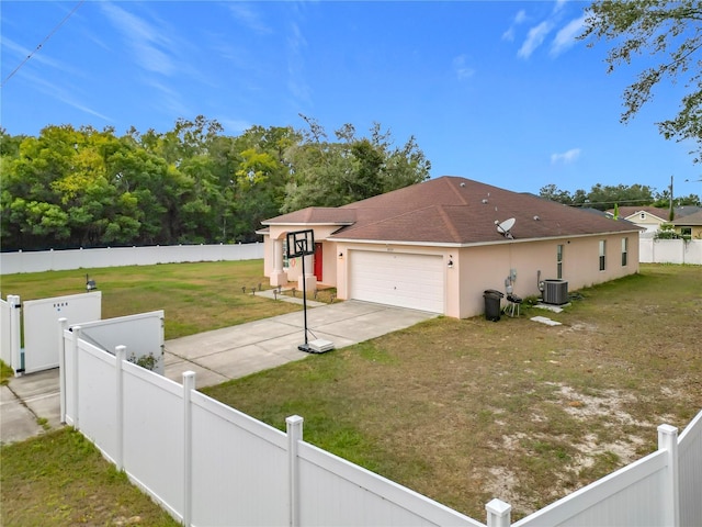 8335 SE 162nd Pl, Summerfield, FL 34491 - view of side of property featuring an attached garage, concrete driveway, stucco siding, roof with shingles, and central AC unit