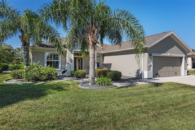 ranch-style house featuring a front yard and a garage