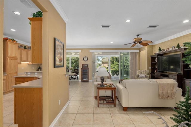 tiled living room featuring crown molding and ceiling fan