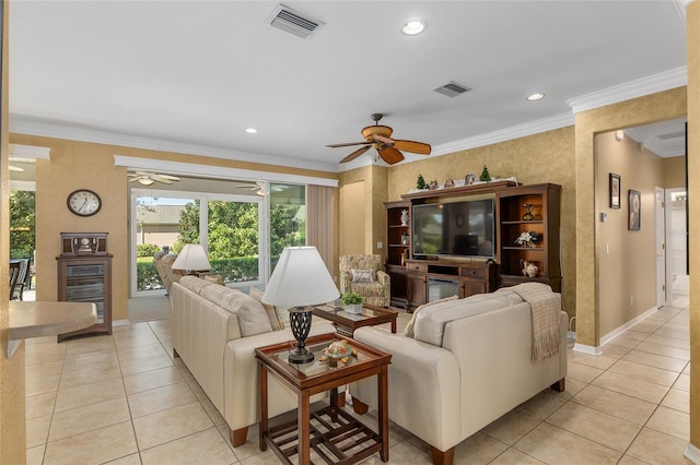 living room featuring crown molding, light tile patterned flooring, and ceiling fan