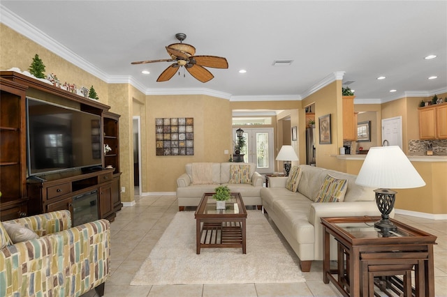 tiled living room featuring crown molding and ceiling fan