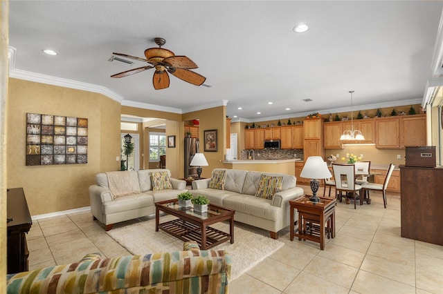 living room with crown molding, light tile patterned floors, and ceiling fan with notable chandelier