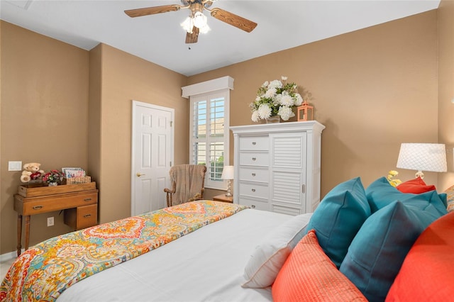 bedroom featuring ceiling fan