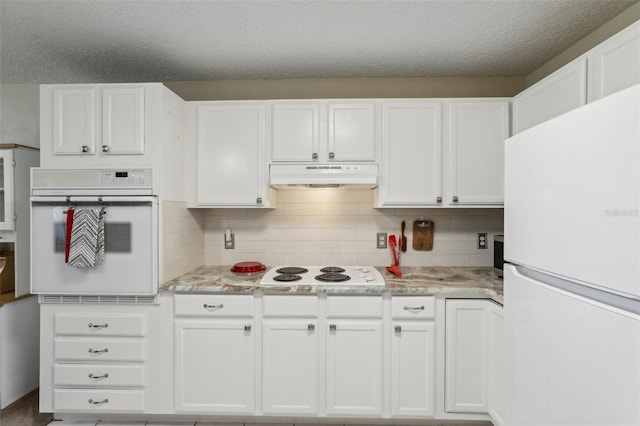 kitchen featuring a textured ceiling, white appliances, and white cabinetry