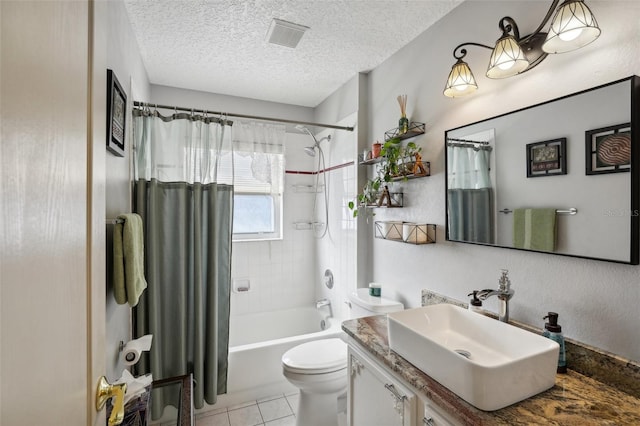 full bathroom with shower / tub combo with curtain, vanity, a textured ceiling, and toilet