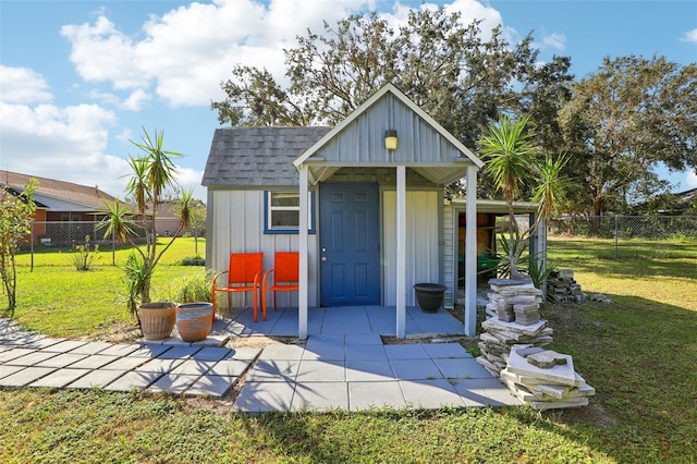 view of outdoor structure with a lawn