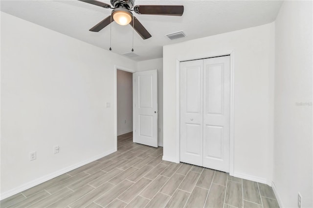 unfurnished bedroom with a closet, ceiling fan, and light hardwood / wood-style flooring