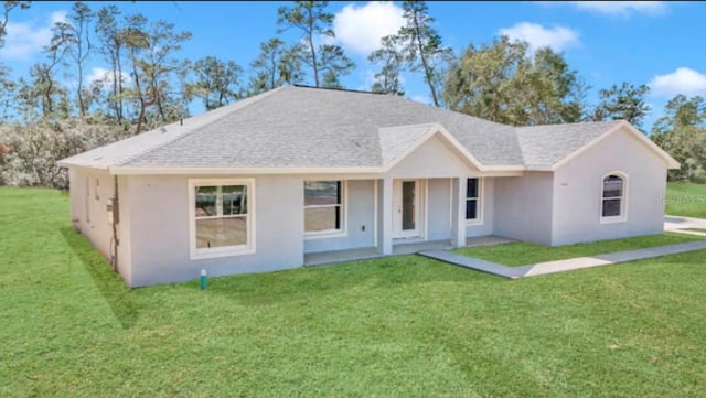 view of front of home with a front yard