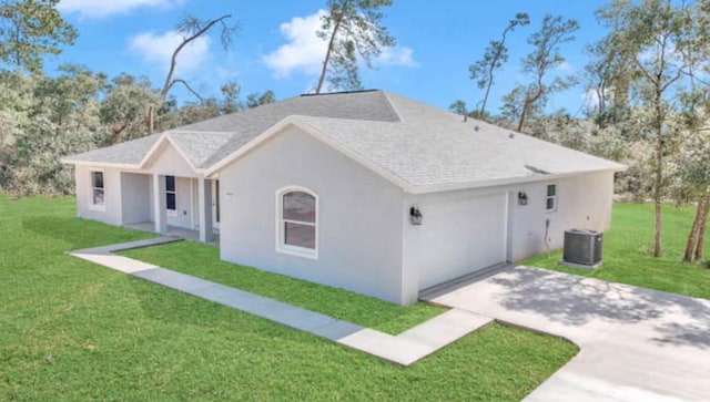 ranch-style house featuring central air condition unit and a front yard