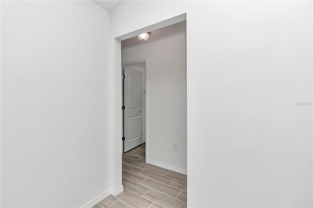 hallway featuring light hardwood / wood-style floors