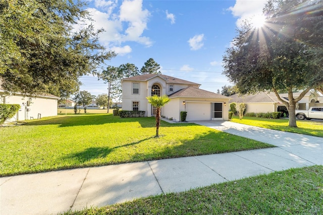 view of front of house with a front lawn and a garage