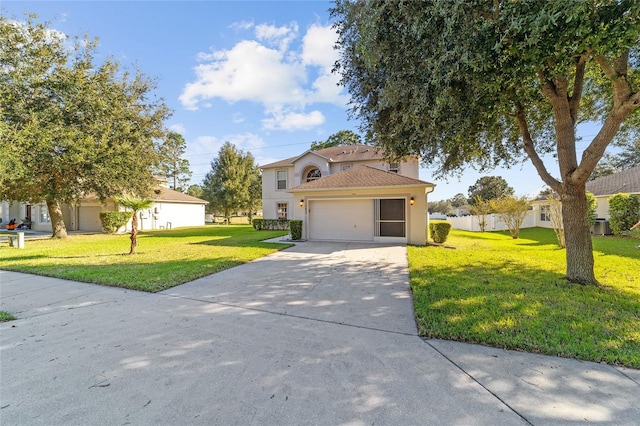 view of front of home featuring a front lawn and a garage