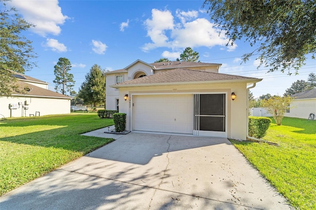 view of front facade featuring a front lawn and a garage