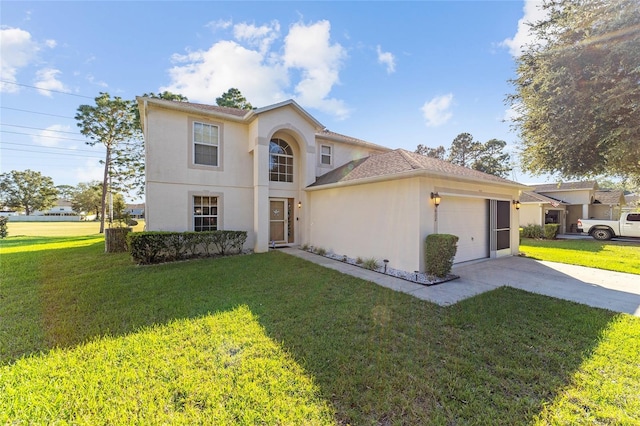 view of property featuring a front lawn and a garage