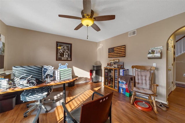 office space featuring hardwood / wood-style floors and ceiling fan