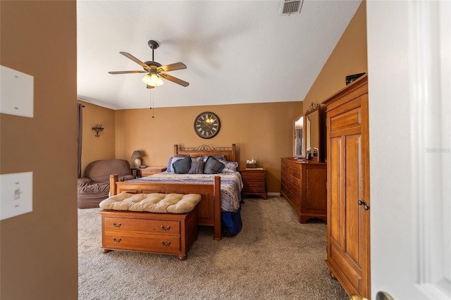 bedroom featuring ceiling fan, light carpet, and vaulted ceiling