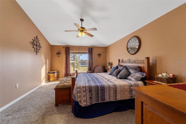 carpeted bedroom featuring vaulted ceiling and ceiling fan