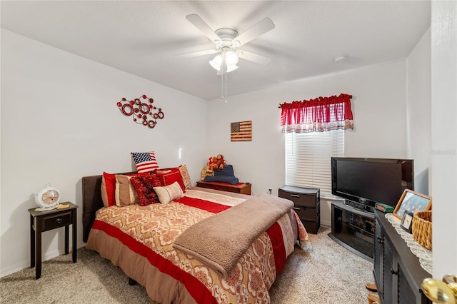 bedroom with light carpet and ceiling fan