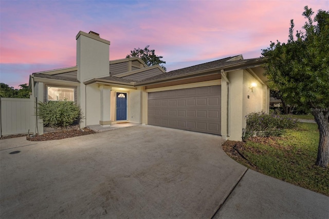 view of front of property with a garage