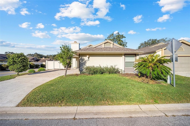 ranch-style house with a front yard and a garage