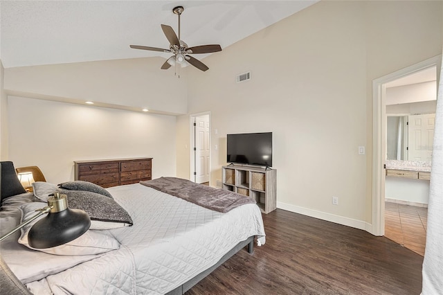 bedroom with ensuite bath, dark hardwood / wood-style floors, high vaulted ceiling, and ceiling fan